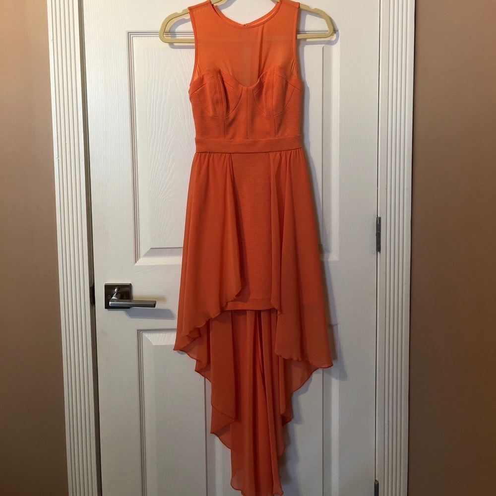 Bebe coral bandage dress with tail.